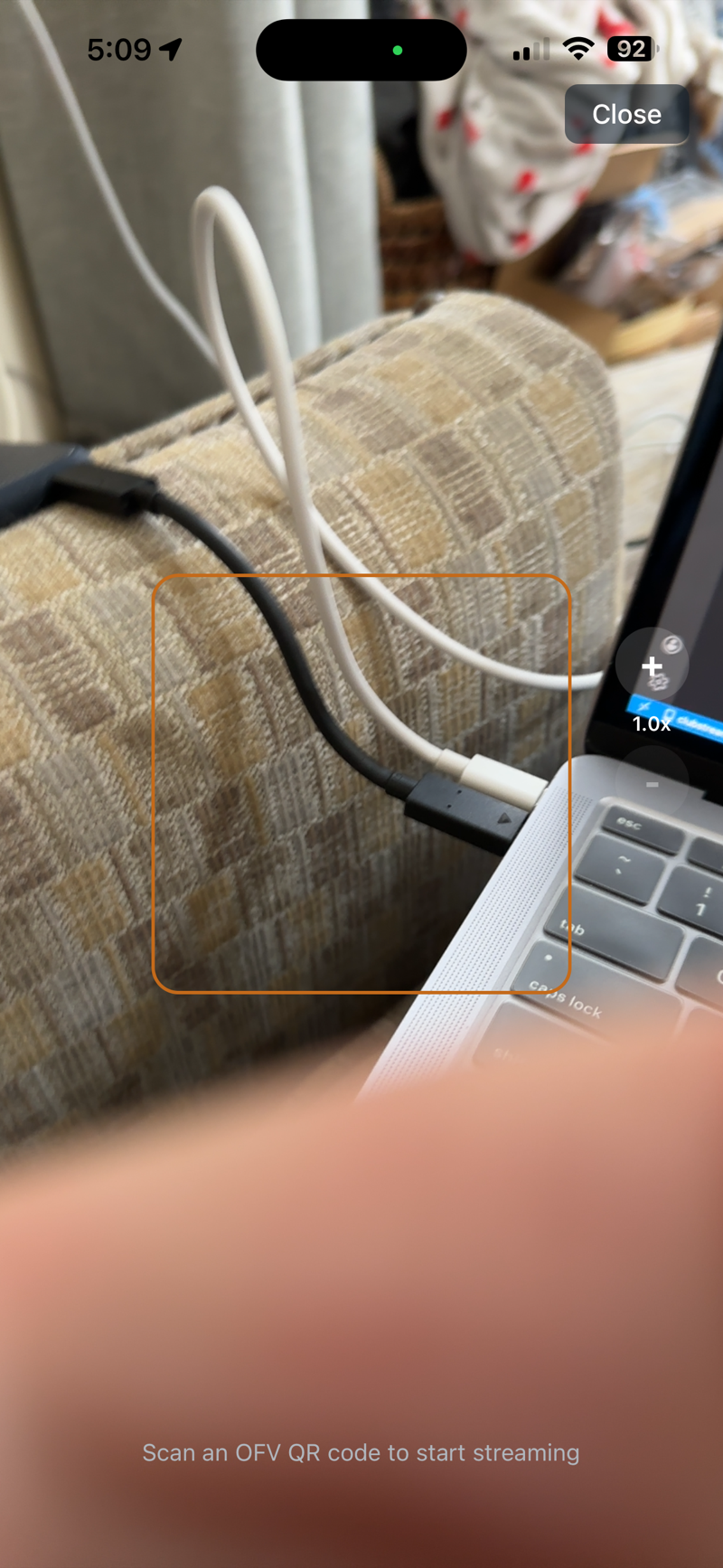 QR Scanner with copper scan frame and zoom buttons