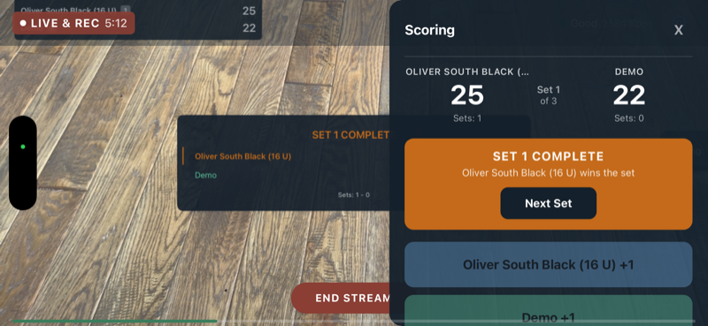 SET 1 COMPLETE banner showing 25-22 score